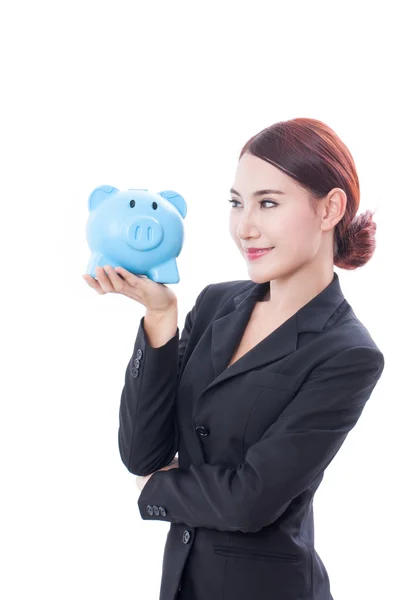 Glimlachende zakenvrouw houden piggy bank — Stockfoto