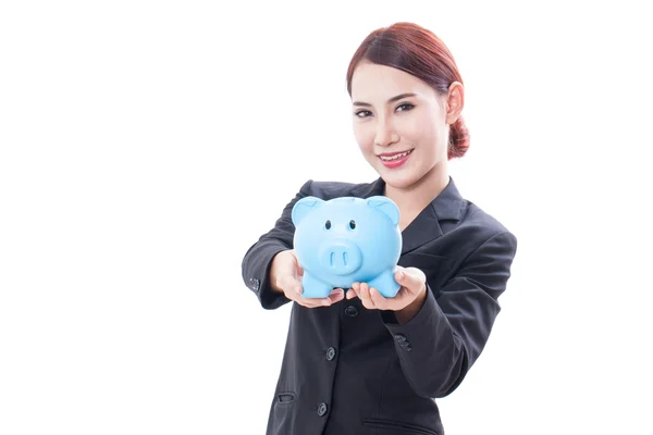Smiling young businesswoman holding piggy bank. — Stock Photo, Image