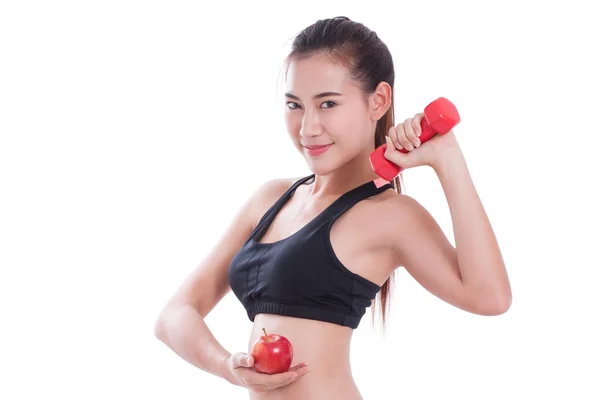 Sport woman with lifting weights and holding apple. healthy concept — Stock Photo, Image