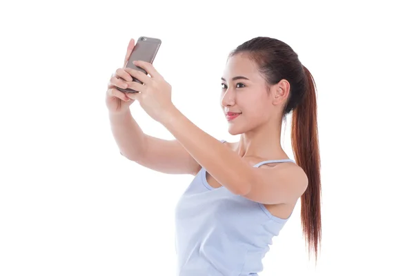 Gyönyörű fiatal nő, figyelembe selfie kép a stúdióban — Stock Fotó