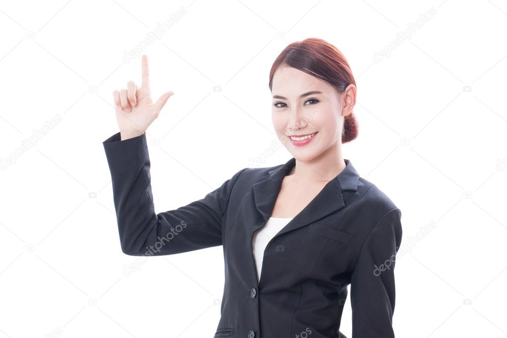Young business asian woman pointing up on white background