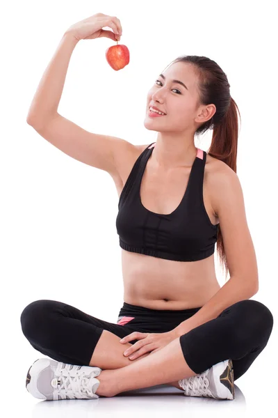 Fitness young woman holding apple on white background. healty concept — Stock Photo, Image