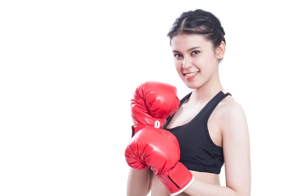 Fitness vrouw met de rode bokshandschoenen. — Stockfoto