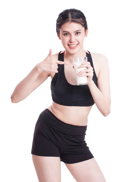 Beautiful healthy woman holding glass of milk — Stock Photo, Image