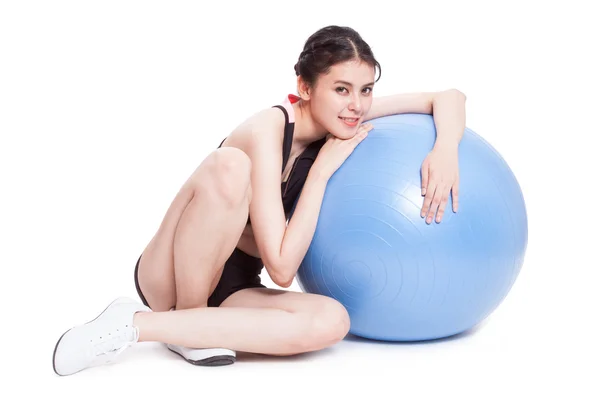 Sport young woman doing exercises with fitness ball — Stock Photo, Image