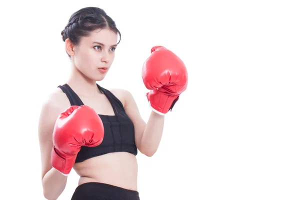 Fitness vrouw met de rode bokshandschoenen — Stockfoto