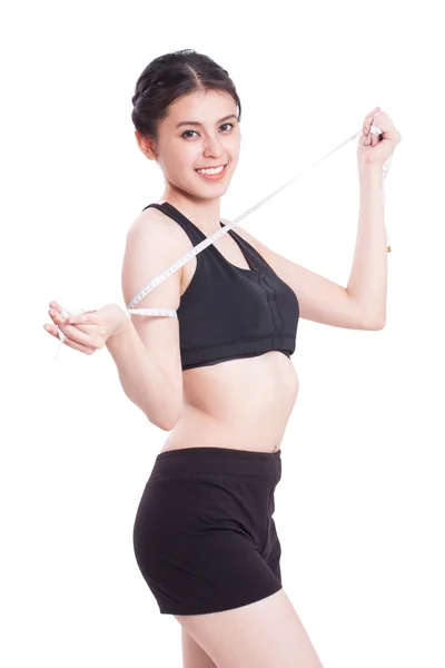 Fitness giovane donna prendendo misure del suo corpo. concetto sano — Foto Stock