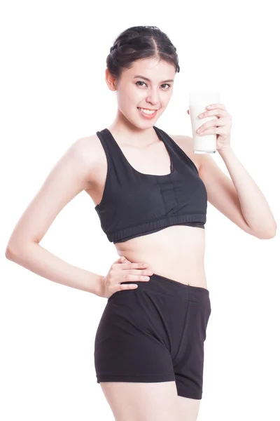 Beautiful healthy woman holding glass of milk — Stock Photo, Image