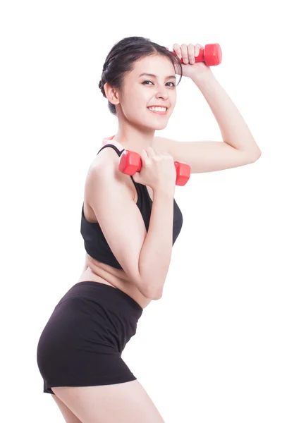 Donna sportiva che fa esercizio con sollevamento pesi — Foto Stock