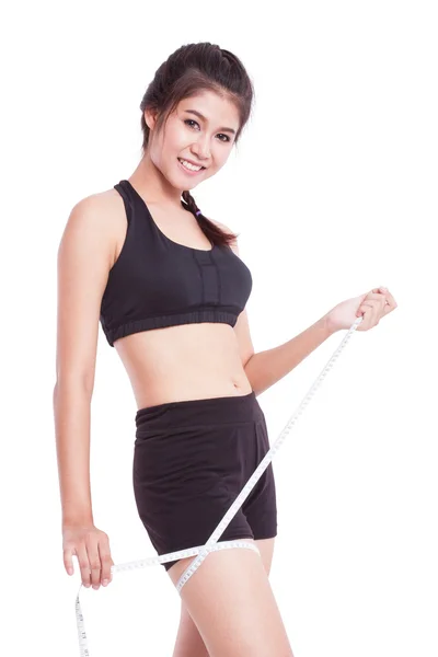Fitness young woman with measuring tape — Stock Photo, Image