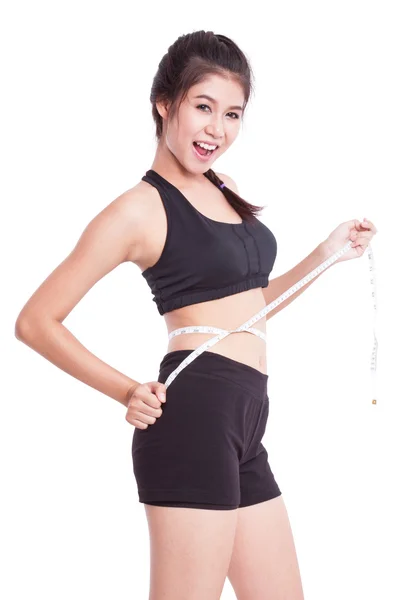 De jonge vrouw Fitness met meetlint — Stockfoto