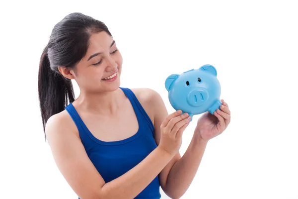 Happy woman holding pink piggy bank isolated on white background — Stock Photo, Image