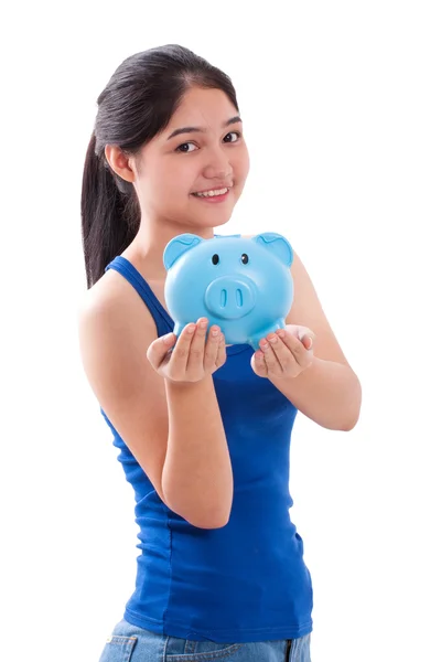 Happy young woman holding piggy bank isolated on white background — Stock Photo, Image