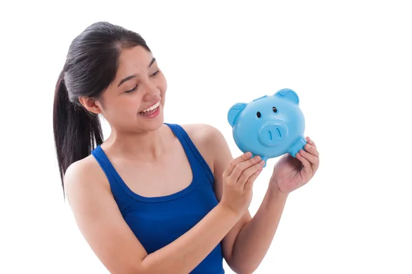 Happy young woman holding piggy bank isolated on white background — Stock Photo, Image