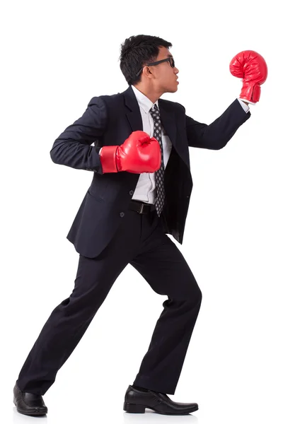 Businessman wearing red boxing gloves — Stock Photo, Image