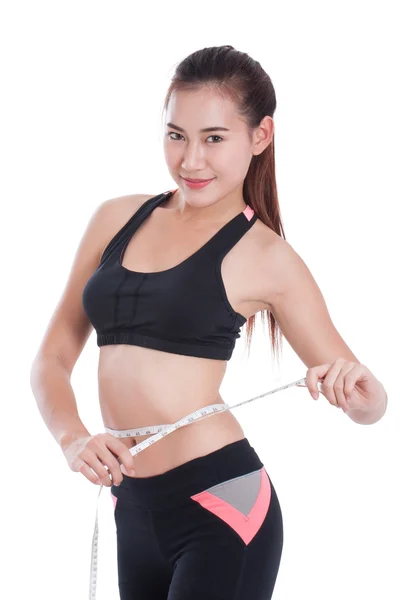 Fitness young woman with measuring tape — Stock Photo, Image