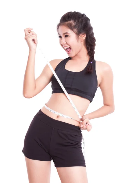 Fitness young woman with measuring tape — Stock Photo, Image