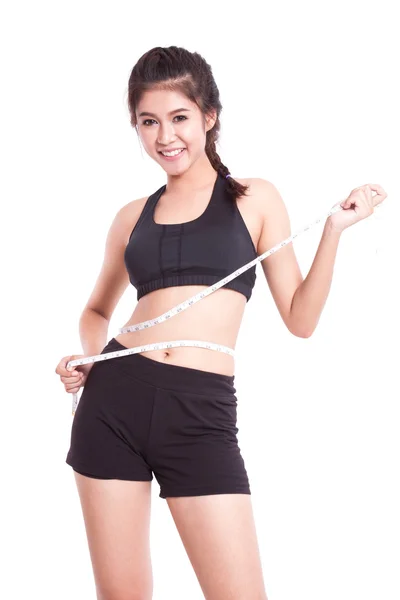 Teyp ölçme ile genç kadın fitness — Stok fotoğraf