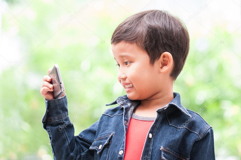 little boy with smartphone