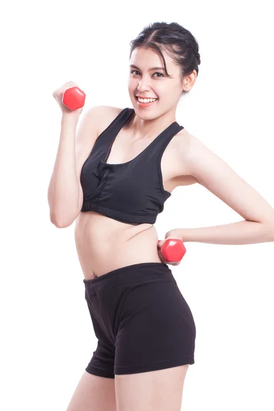 Femme sportive faisant de l'exercice avec haltères — Photo