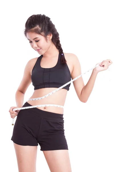 Fitness young woman with measuring tape — Stock Photo, Image