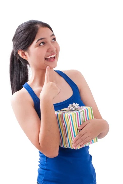 Young woman holding gift — Stock Photo, Image