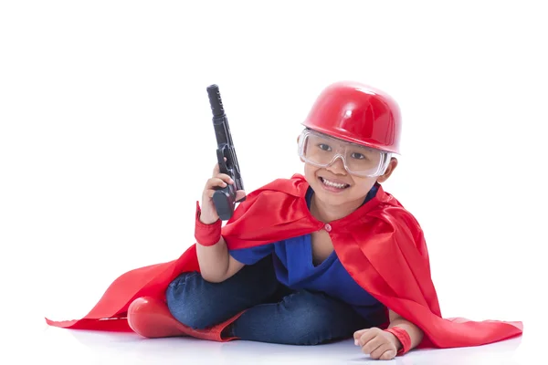 Kleiner Junge Superheld mit Waffe — Stockfoto