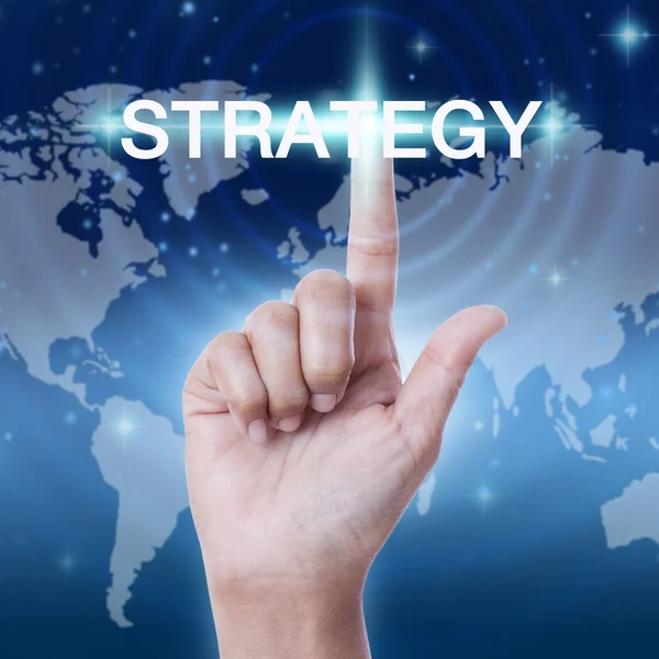 Hand pressing strategy button — Stock Photo, Image