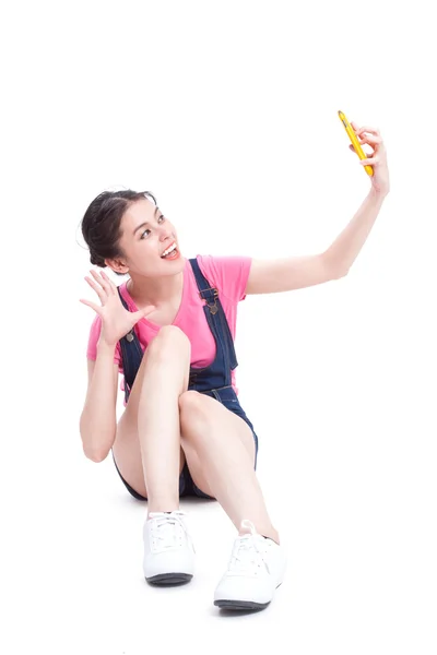 Girl taking selfie with smartphone — Stock Photo, Image