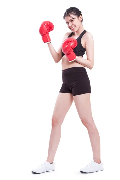 Mujer fitness usando guantes de boxeo —  Fotos de Stock