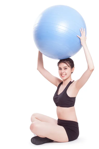 Entrenamiento de mujer con pelota de ejercicio —  Fotos de Stock