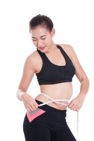 Fitness young woman with measuring tape — Stock Photo, Image