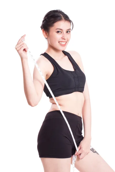 Teyp ölçme ile genç kadın fitness — Stok fotoğraf