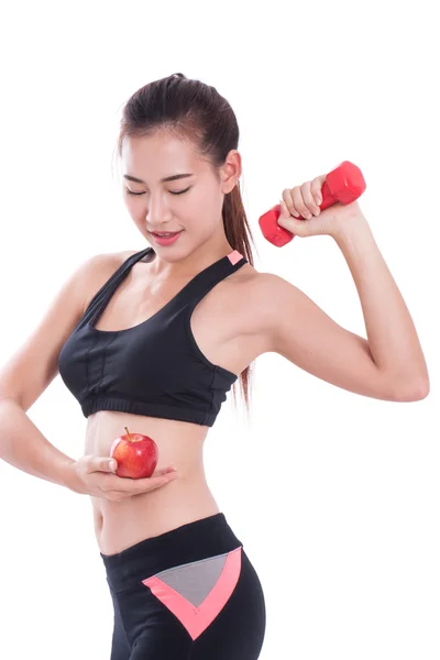 Fitness mladá žena hospodářství jablko — Stock fotografie