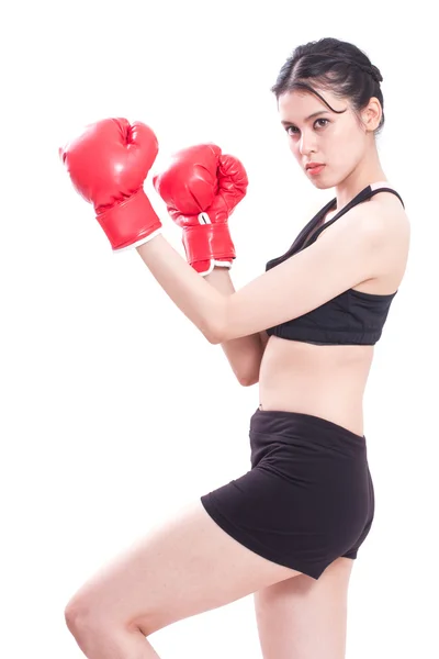 Fitness vrouw dragen van bokshandschoenen — Stockfoto