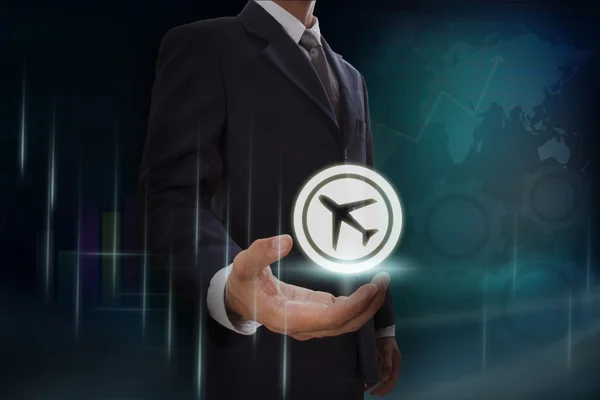 Empresário mostrando ícone de avião — Fotografia de Stock