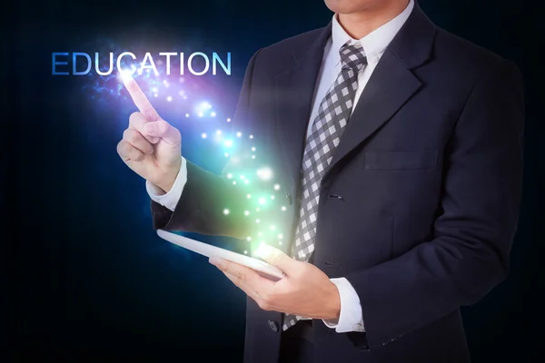 Businessman pressing education sign — Stock Photo, Image