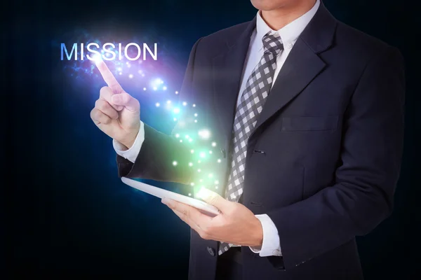 Businessman pressing mission sign — Stock Photo, Image