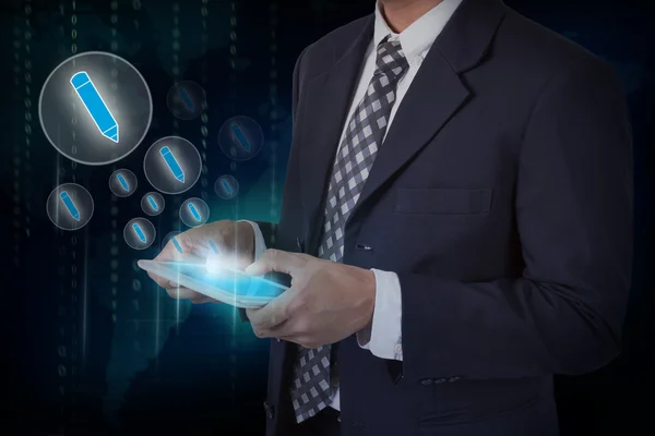 Businessman pressing pencil button — Stock Photo, Image