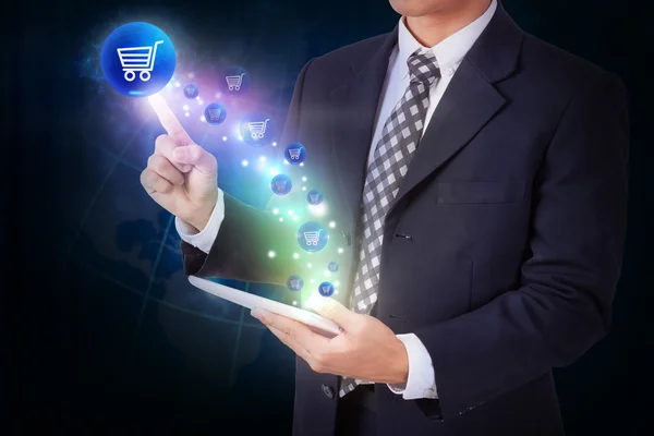 Businessman pressing shopping cart button — Stock Photo, Image