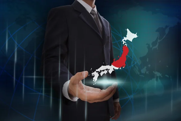 Businessman showing map of Japan — Stock Photo, Image