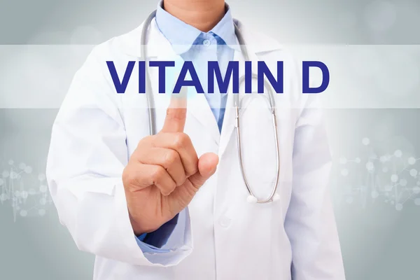 Médico tocando signo de vitamina D — Foto de Stock