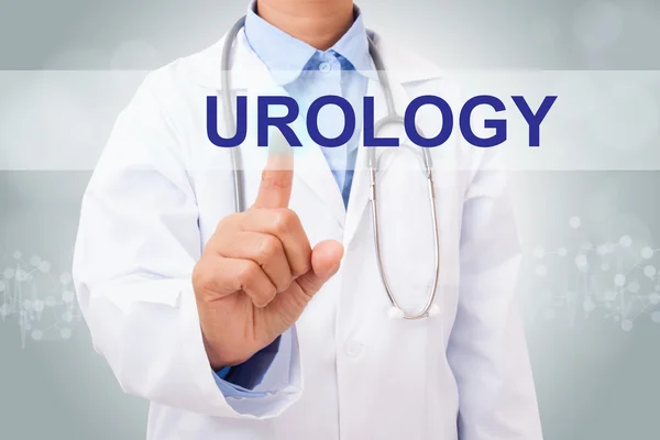 Arzt rührt Urologie-Schild an — Stockfoto