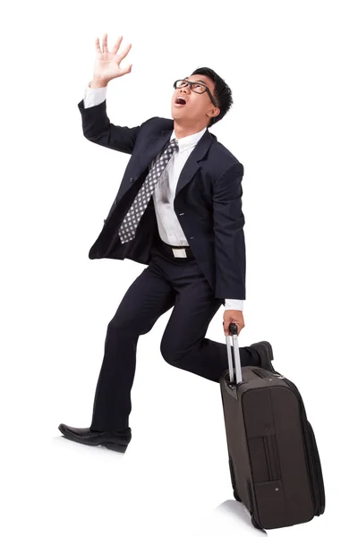 Бизнесмен путешествует с чемоданом — стоковое фото