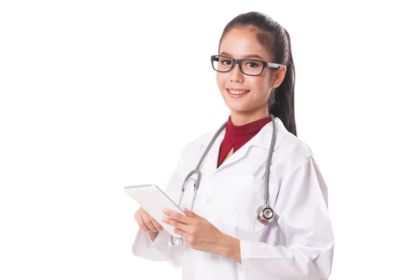 Female doctor using a digital tablet on white background. — Stock Photo, Image