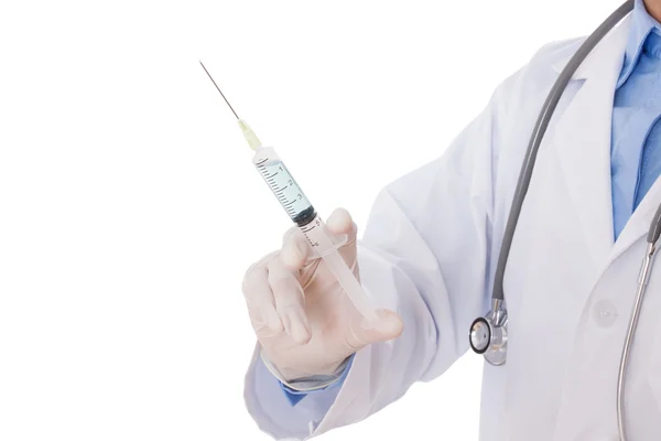 Doctor holding syringe in hands Stock Picture