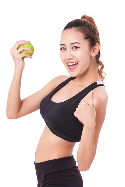 Fitness jonge vrouw bedrijf apple — Stockfoto