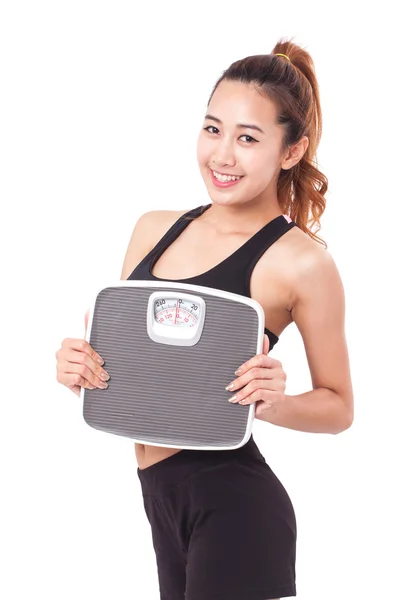 Woman with weight scales — Stock Photo, Image