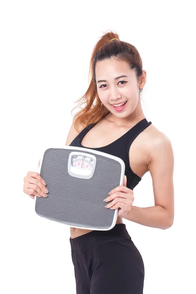 Woman with weight scales — Stock Photo, Image