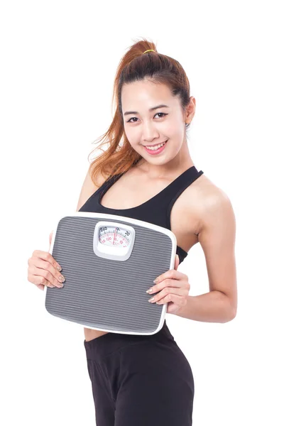 Woman with weight scales — Stock Photo, Image